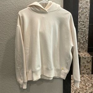 A new day cream hoodie with stitching detail
